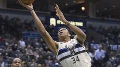 Mar 2, 2018; Milwaukee, WI, USA;  Milwaukee Bucks forward Giannis Antetokounmpo (34) takes a shot against Indiana Pacers forward Thaddeus Young (21) in the third quarter at the BMO Harris Bradley Center. Mandatory Credit: Benny Sieu-USA TODAY Sports