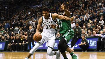 MILWAUKEE, WI - APRIL 20: Giannis Antetokounmpo #34 of the Milwaukee Bucks drives around Semi Ojeleye #37 of the Boston Celtics during the second half of game three of round one of the Eastern Conference playoffs at the Bradley Center on April 20, 2018 in