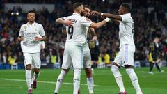 MADRID, SPAIN - FEBRUARY 15: Karim Benzema of Real Madrid celebrates with David Alaba and Dani Ceballos after scoring the team's third goal during the LaLiga Santander match between Real Madrid CF and Elche CF at Estadio Santiago Bernabeu on February 15, 2023 in Madrid, Spain. (Photo by Angel Martinez/Getty Images)