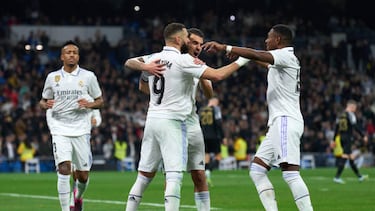 MADRID, SPAIN - FEBRUARY 15: Karim Benzema of Real Madrid celebrates with David Alaba and Dani Ceballos after scoring the team's third goal during the LaLiga Santander match between Real Madrid CF and Elche CF at Estadio Santiago Bernabeu on February 15, 2023 in Madrid, Spain. (Photo by Angel Martinez/Getty Images)