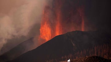 The Cumbre Vieja volcano spews lava, ash and smoke as seen from Los Llanos de Aridane on the Canary island of La Palma in September 25, 2021.