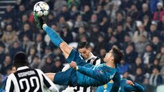 (FILES) In this file photo taken on April 03, 2018 Real Madrid&#039;s Portuguese forward Cristiano Ronaldo (C) overhead kicks and scores during the UEFA Champions League quarter-final first leg football match between Juventus and Real Madrid at the Allianz Stadium in Turin.
 Spain&#039;s media said goodbye to superstar Cristiano Ronaldo while Italy&#039;s welcomed him on July 6, 2018 after persistent reports that the five-time Ballon d&#039;Or winner will leave Real Madrid for Italian champions Juventus. / AFP PHOTO / Alberto PIZZOLI