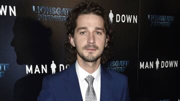 FILE - This Nov. 30, 2016 file photo shows Shia LaBeouf at the premiere of &quot;Man Down&quot; in Los Angeles. LaBeouf led a group of teenagers with the chant: &ldquo;He will not divide us.&rdquo; Looking into a camera placed on a wall outside the Museum of the Moving Image in New York, a diverse group of teenagers chanted the words on the day Donald Trump was named president in Washington, D.C. (Photo by Chris Pizzello/Invision/AP, File)