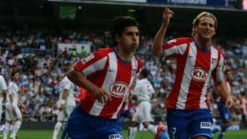 <b>ONCE EN LIGA. </b>El Kun y Forlán celebran el gol en el primer minuto del argentino ante el Madrid. Su sociedad ha resultado fantástica: en Liga suman ya once goles. En total, son 20.