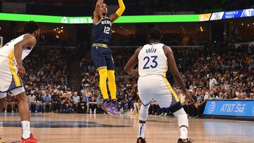 The Memphis Grizzlies have held off the Golden State Warriors at home to win Game 2 106-101 and even the second round of the playoff series.