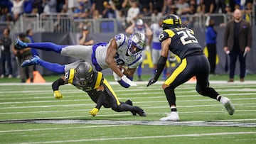 SAN ANTONIO, TX - FEBRUARY 19: Hakeem Butler #88 of the St. Louis Battlehawks is upended by Anthony Texada #22 of the San Antonio Brahmas at the Alamodome on February 19, 2023 in San Antonio, Texas. Ronald Cortes/Getty Images/AFP (Photo by Ronald Cortes / GETTY IMAGES NORTH AMERICA / Getty Images via AFP)