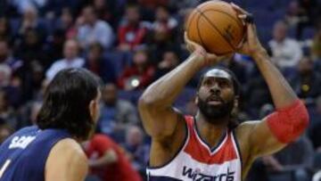 Nene Hilario ante Luis Scola