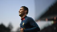 (FILES) This file photo taken on September 27, 2022 shows Portugal's forward Cristiano Ronaldo warming up prior the UEFA Nations League, league A, group 2 football match between Portugal and Spain, at the Municipal Stadium in Braga. - The 37-year-old Portuguese player will be in Qatar for his fifth FIFA World Cup, the last chance to win a world title. (Photo by PATRICIA DE MELO MOREIRA / AFP)