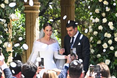 Nacho Boluda y Lucía Gutiérrez tras darse el 'sí quiero', a 28 de junio de 2025, en Santander (España).