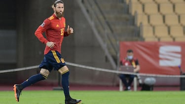 Spain's defender Sergio Ramos runs onto the field during the FIFA World Cup Qatar 2022 qualification football match between Spain and Kosovo at La Cartuja Olympic stadium in Seville on March 31, 2021. (Photo by CRISTINA QUICLER / AFP)