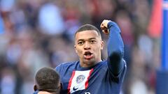 PARIS, FRANCE - NOVEMBER 13:  Kylian Mbappe of Paris Saint - Germain  celebrates with Nuno Mendes after scoring during the French Ligue 1 (L1) soccer match between Paris Saint-Germain (PSG) and AJ Auxerre at Parc des Princes stadium in Paris, France on November 13, 2022. (Photo by Mustafa Yalcin/Anadolu Agency via Getty Images)