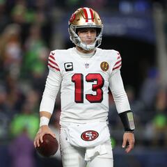 Why did Brock Purdy change his number from 14 to 13?