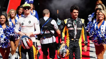 AUSTIN, TX - OCTOBER 22: Nico Hulkenberg of Germany and Renault Sport F1 and Carlos Sainz of Spain and Renault Sport F1 walk to the grid before the United States Formula One Grand Prix at Circuit of The Americas on October 22, 2017 in Austin, Texas. Mark Thompson/Getty Images/AFP
== FOR NEWSPAPERS, INTERNET, TELCOS & TELEVISION USE ONLY ==