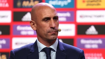 The President of the Spanish Football federation Luis Rubiales sits as he attends the official presentation to the press of Spain's national football team newly appointed head coach in Las Rozas, outside Madrid, on December 12, 2022. (Photo by Thomas COEX / AFP)
