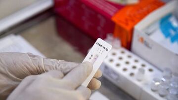 FILE PHOTO: A medical specialist demonstrates a test at a COVID-19 rapid testing centre located at a metro station amid the outbreak of the coronavirus disease in Moscow, Russia November 9, 2021. REUTERS/Tatyana Makeyeva/File Photo