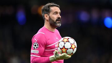 MANCHESTER, ENGLAND - MARCH 09: Scott Carson of Manchester City gathers the ball during the UEFA Champions League Round Of Sixteen Leg Two match between Manchester City and Sporting CP at City of Manchester Stadium on March 09, 2022 in Manchester, England