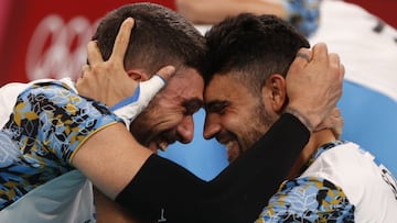 Tokyo 2020 Olympics - Volleyball - Men's Quarterfinal - Italy v Argentina - Ariake Arena, Tokyo, Japan - August 3, 2021. Facundo Conte of Argentina and Sebastian Sole of Argentina celebrate. REUTERS/Valentyn Ogirenko