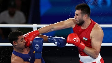 FILE PHOTO: Paris 2024 Olympics - Boxing - Men's +92kg - Final - Roland-Garros Stadium, Paris, France - August 10, 2024. Bakhodir Jalolov of Uzbekistan in action against Ayoub Ghadfa Drissi El Aissaoui of Spain. REUTERS/Pilar Olivares/File Photo