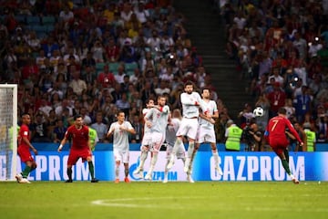 Cristiano curls one over the wall for his hat trick.