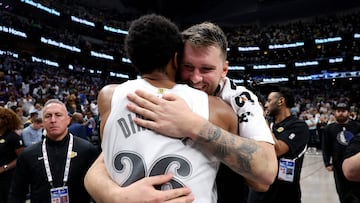 DALLAS, TEXAS - APRIL 09: Spencer Dinwiddie #26 of the Dallas Mavericks embraces Luka Doncic #77 of the Los Angeles Lakers after the game at American Airlines Center on April 09, 2025 in Dallas, Texas. NOTE TO USER: User expressly acknowledges and agrees that, by downloading and or using this photograph, user is consenting to the terms and conditions of the Getty Images License Agreement. Sam Hodde/Getty Images/AFP (Photo by Sam Hodde / GETTY IMAGES NORTH AMERICA / Getty Images via AFP)