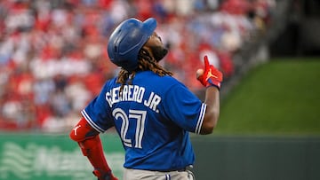 Mar 30, 2023; St. Louis, Missouri, USA;  Toronto Blue Jays first baseman Vladimir Guerrero Jr. (27) reacts after hitting the go ahead sacrifice fly against the St. Louis Cardinals during the ninth inning at Busch Stadium. Mandatory Credit: Jeff Curry-USA TODAY Sports