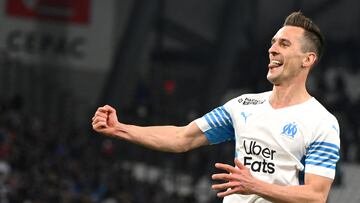 Marseille's Polish forward Arkadiusz Milik celebrates after scoring a goal during the French L1 football match between Olympique Marseille (OM) and SCO Angers at Stade Velodrome in Marseille, southern France, on February 4, 2022. (Photo by Nicolas TUCAT / AFP)