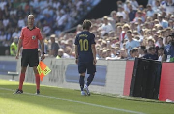 Modric walks off after being handed a red card against Celta Vigo.