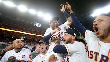 HOUSTON, TX - OCTOBER 21: Jose Altuve #27 of the Houston Astros celebrates with Alex Bregman #2, Marwin Gonzalez #9 and Carlos Correa #1 after defeating the New York Yankees by a score of 4-0 to win Game Seven of the American League Championship Series at Minute Maid Park on October 21, 2017 in Houston, Texas. The Houston Astros advance to face the Los Angeles Dodgers in the World Series.   Elsa/Getty Images/AFP
 == FOR NEWSPAPERS, INTERNET, TELCOS &amp; TELEVISION USE ONLY ==