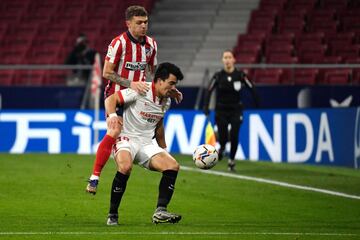 Kieran Trippier y Marcos Acuña.