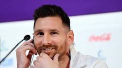 DOHA, QATAR - NOVEMBER 21: Lionel Messi of Argentina reacts  during the Argentina match day -1 Press Conference at Main Media Center on November 21, 2022 in Doha, Qatar. (Photo by Michael Regan - FIFA/FIFA via Getty Images)