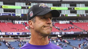 FOXBOROUGH, MASSACHUSETTS - SEPTEMBER 25: Head coach John Harbaugh of the Baltimore Ravens walks to midfield after his team's 37-26 win against the New England Patriots at Gillette Stadium on September 25, 2022 in Foxborough, Massachusetts.   Adam Glanzman/Getty Images/AFP