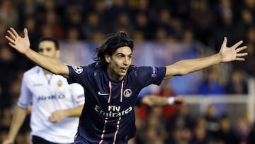 Paris Saint Germain's Javier Pastore celebrates after scoring a goal against Valencia during their Champions League soccer match at Mestalla stadium in Valencia February 12, 2013. REUTERS/Heino Kalis (SPAIN - Tags: SPORT SOCCER)