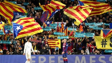 Barcelona fined and threatened with stadium closure over balls thrown onto field during Clásico