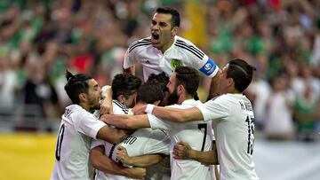 Mexico celebrate victory against Uruguay.