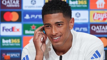 Real Madrid's English midfielder #05 Jude Bellingham addresses a press conference on April 14, 2026 in Munich, southern Germany, on the eve of the UEFA Champions League quarter-final second leg football match between FC Bayern Munich and Real Madrid. (Photo by Karl-Josef HILDENBRAND / AFP)