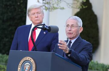 A stable genius talks about the current crisis, as US President Donald J. Trump looks on.