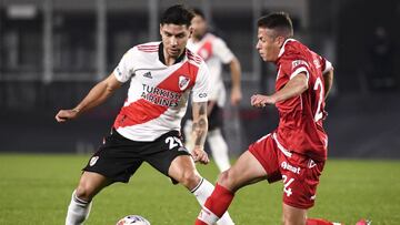 BUENOS AIRES, ARGENTINA - AUGUST 01: Nicolas Silva of Huracan competes for the ball with Gonzalo Montiel of River Plate during a match between River Plate v Huracan as part of Torneo Liga Profesional 2021 at Estadio Monumental Antonio Vespucio Liberti on