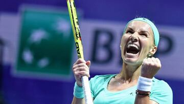 Russia&#039;s Svetlana Kuznetsova celebrates after winning against Karolina Pliskova of the Czech Republic in their women&#039;s singles match during the WTA Finals  tennis tournament on October 26, 2016 in Singapore. / AFP PHOTO / ROSLAN RAHMAN