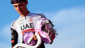 Second placed UAE Team Emirates XRG's Mexican rider Isaac Del Toro celebrates on the podium at the end of the 21st and last stage of the 108th Giro d'Italia cycling race of 143kms from Rome to Rome on June 1, 2025. (Photo by Luca Bettini / AFP)