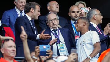 LYON, FRANCE - JULY 07: Emmanuel Macron President of France, Noel Le Graet President of the French Football Federation and Kylian Mbappe International soccer player are talking during the 2019 FIFA Women's World Cup France Final match between The United States of America and The Netherlands at Stade de Lyon on July 7, 2019 in Lyon, France. (Photo by Catherine Steenkeste/Getty Images)