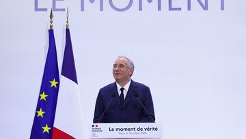 French Prime Minister Francois Bayrou reacts during a news conference to present a major public finance recovery plan, outlining his first budgetary orientations for 2026, in Paris, France, July 15, 2025. The slogan reads "The moment of truth". REUTERS/Abdul Saboor TPX IMAGES OF THE DAY