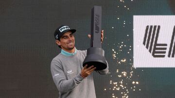 Golf - LIV Golf - Britain - JCB Golf & Country Club, Rocester, Britain - July 27, 2025 Torque GC's Joaquin Niemann celebrates with a trophy after winning the LIV Golf Britain Action Images via Reuters/Andrew Couldridge