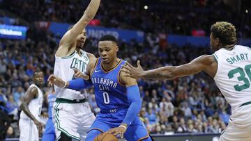 Oct 25, 2018; Oklahoma City, OK, USA; Oklahoma City Thunder guard Russell Westbrook, center, drives to the basket between Boston Celtics forward Jayson Tatum, left, and Boston Celtics guard Marcus Smart, right, during the second quarter at Chesapeake Energy Arena. Mandatory Credit: Alonzo Adams-USA TODAY Sports