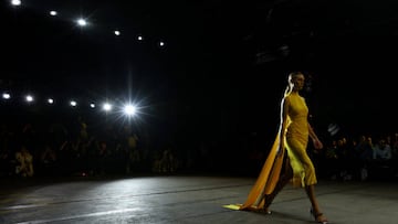 SYDNEY, AUSTRALIA - MAY 11: A model walks the runway in a design by Cue during Afterpay's Future of Fashion show during Afterpay Australian Fashion Week 2022 Resort '23 Collections at Carriageworks on May 11, 2022 in Sydney, Australia. (Photo by Caroline McCredie/Getty Images)
