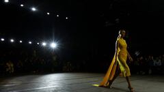 SYDNEY, AUSTRALIA - MAY 11: A model walks the runway in a design by Cue during Afterpay's Future of Fashion show during Afterpay Australian Fashion Week 2022 Resort '23 Collections at Carriageworks on May 11, 2022 in Sydney, Australia. (Photo by Caroline McCredie/Getty Images)