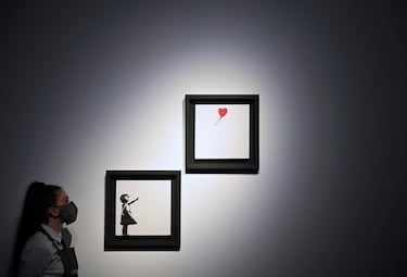 El día que el artista callejero Banksy autodestruyó una de sus más famosas obras tras venderla por más de 1 millón de dólares