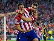 Koke celebra con Villa su decisivo 0-1 en los cuartos de Champions de la 13-14 ante el Barcelona.