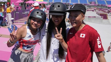Silver medalist Kokona Hiraki, of Japan, center, and gold medalist Sakura Yosozumi of Japan and bronze medalist Sky Brown of Britain, left, pose for photos after the women&#039;s park skateboarding finals at the 2020 Summer Olympics, Wednesday, Aug. 4, 2021, in Tokyo, Japan. (AP Photo/Ben Curtis)