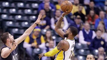 Paul George y Joe Harris en un lance del juego