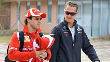 Felipe Massa y Michael Schumacher.